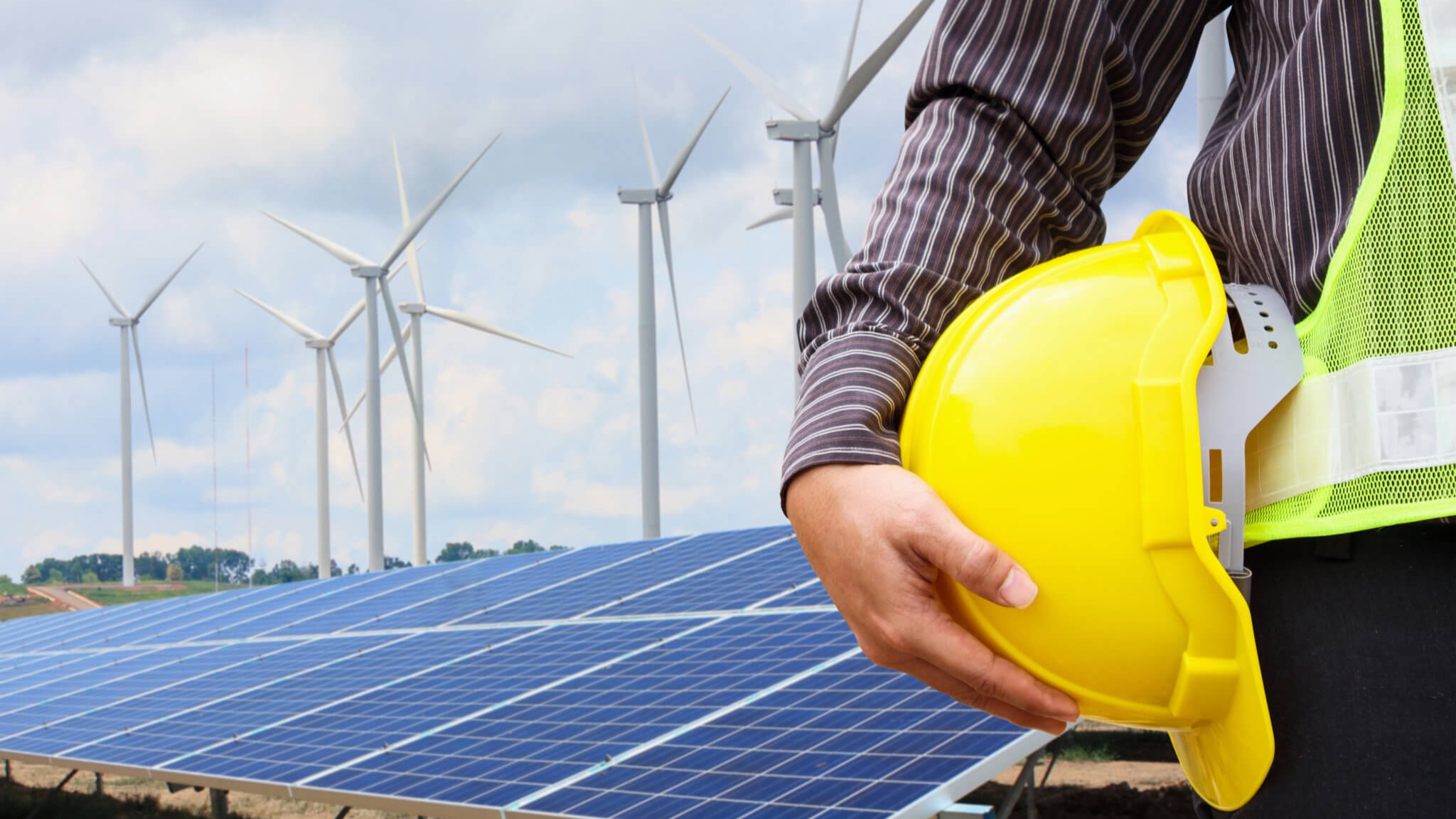 Wind-solar farm worker