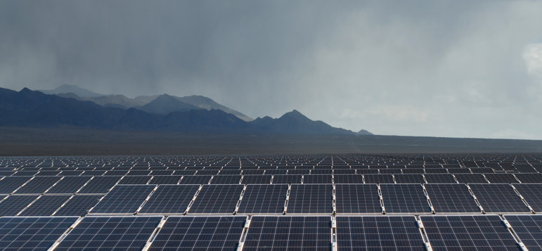 dark clouds over solar farm