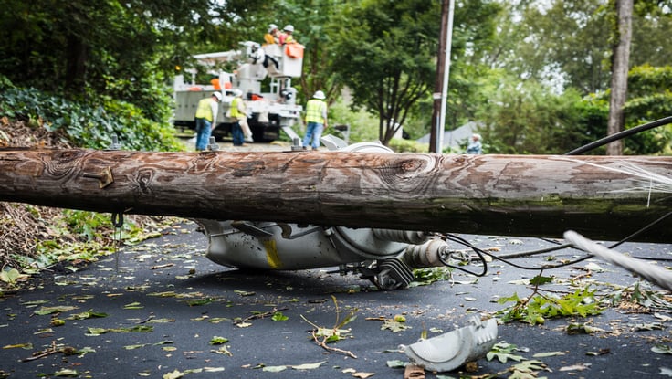 Downed utility pole after high winds
