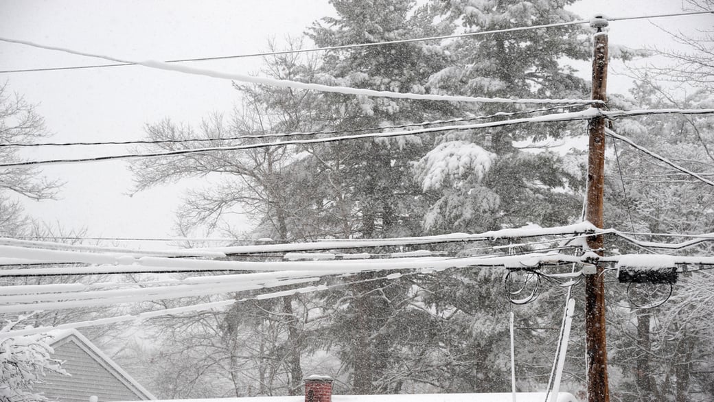 Snow and ice on utility lines