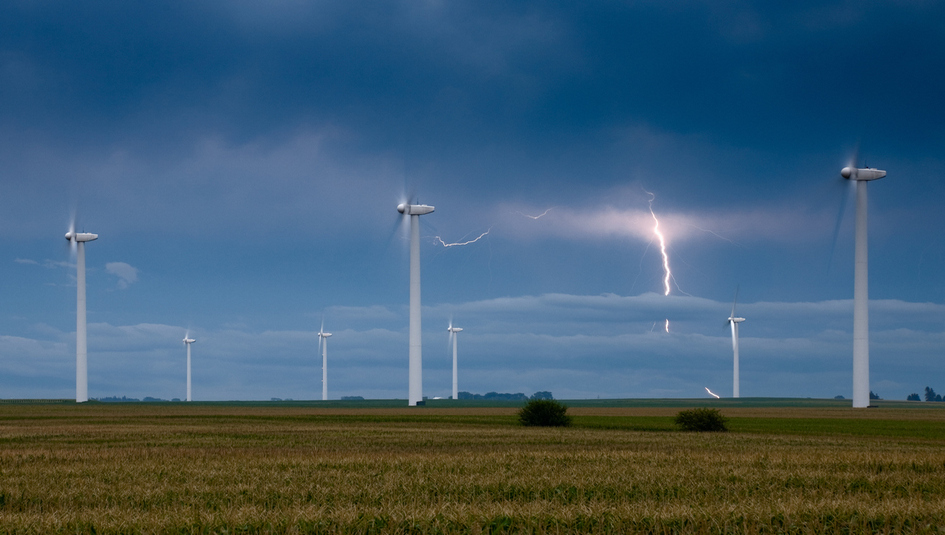 Lightning at a wind farm-day