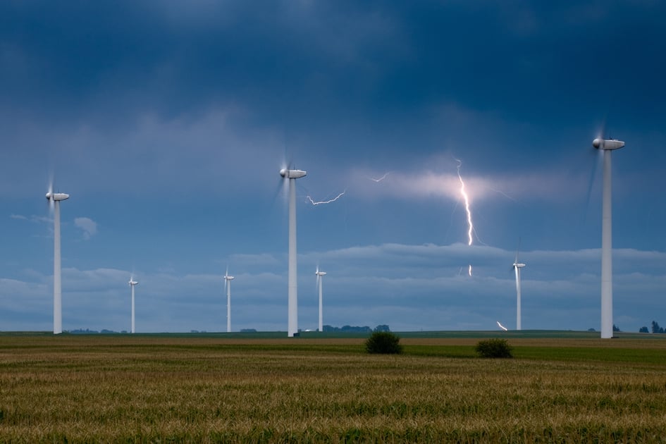 Lightning at a wind farm-day