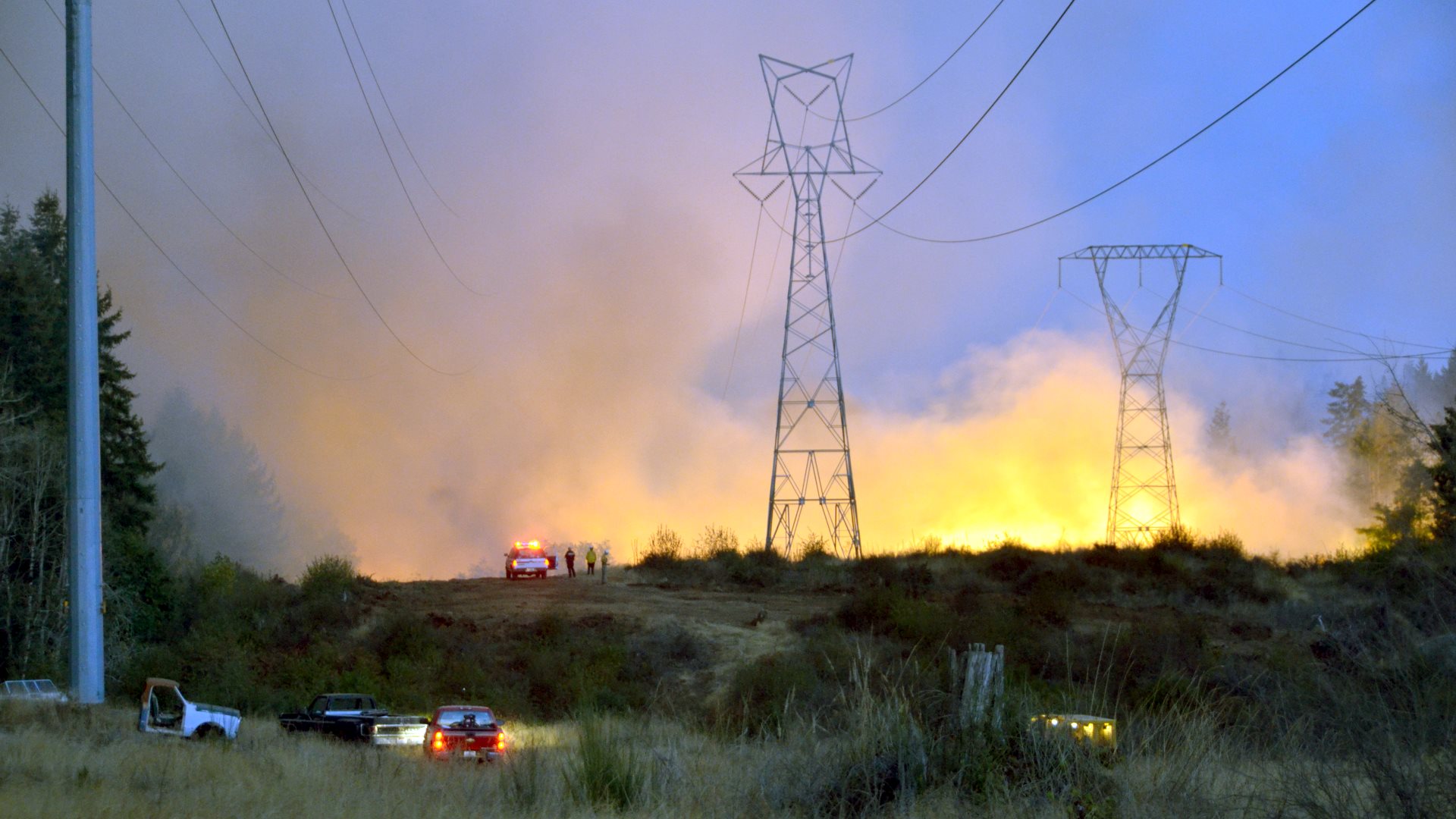 Wildfire approaching utility assets